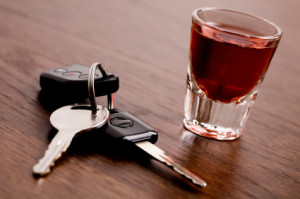 Car keys and a shot glass